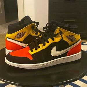 Jordan 1 Mid Black Amarillo Orange